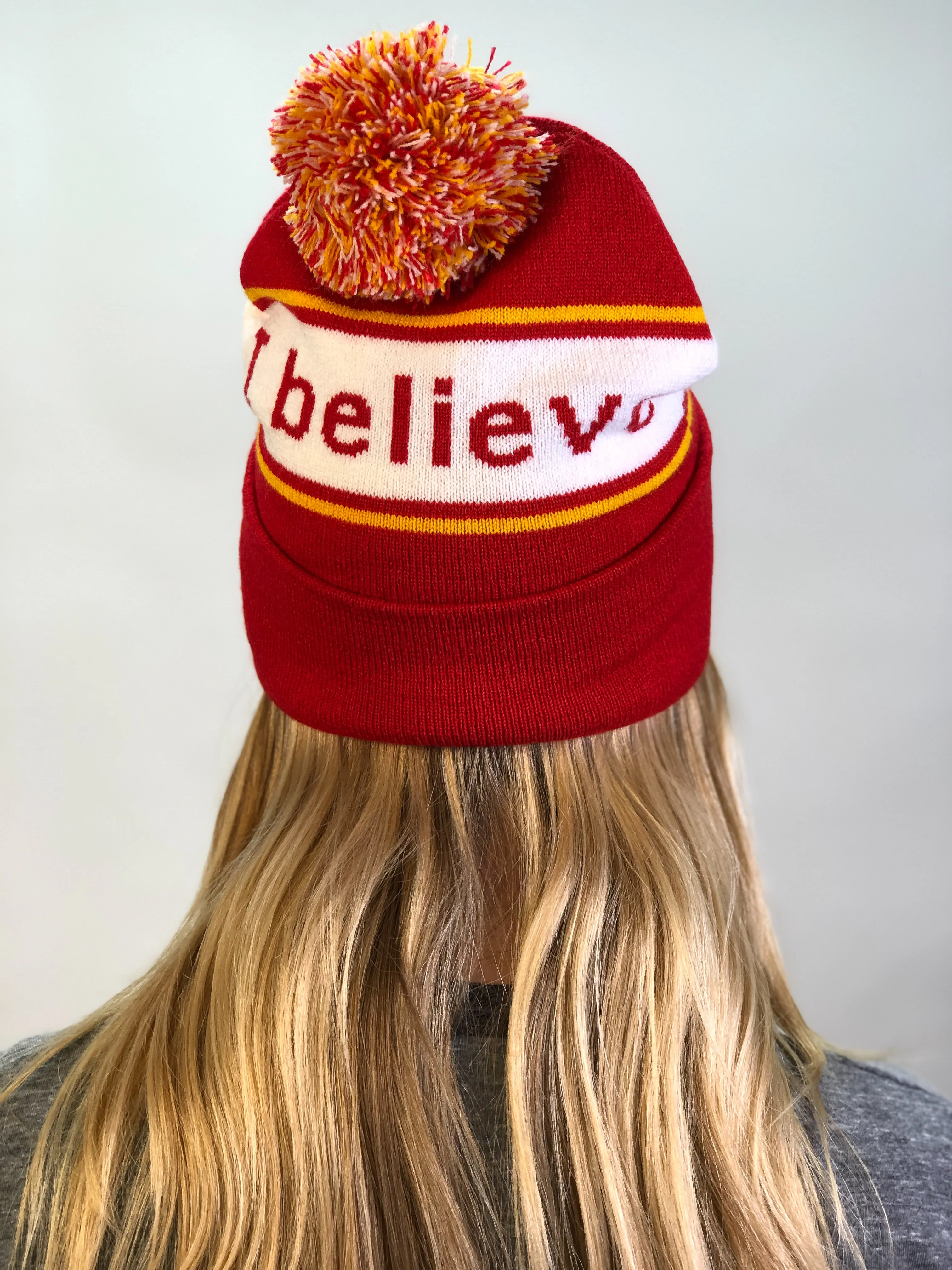 I believe™ red & gold knit beanie with We are awesome™ on inside cuff